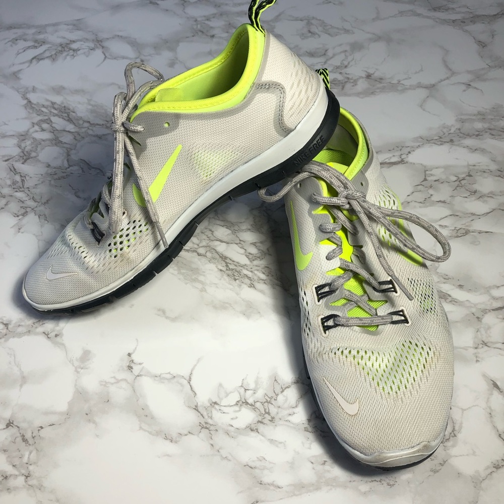 Nike Free 5.0 Running shoe Sz 9.5 white and yellow